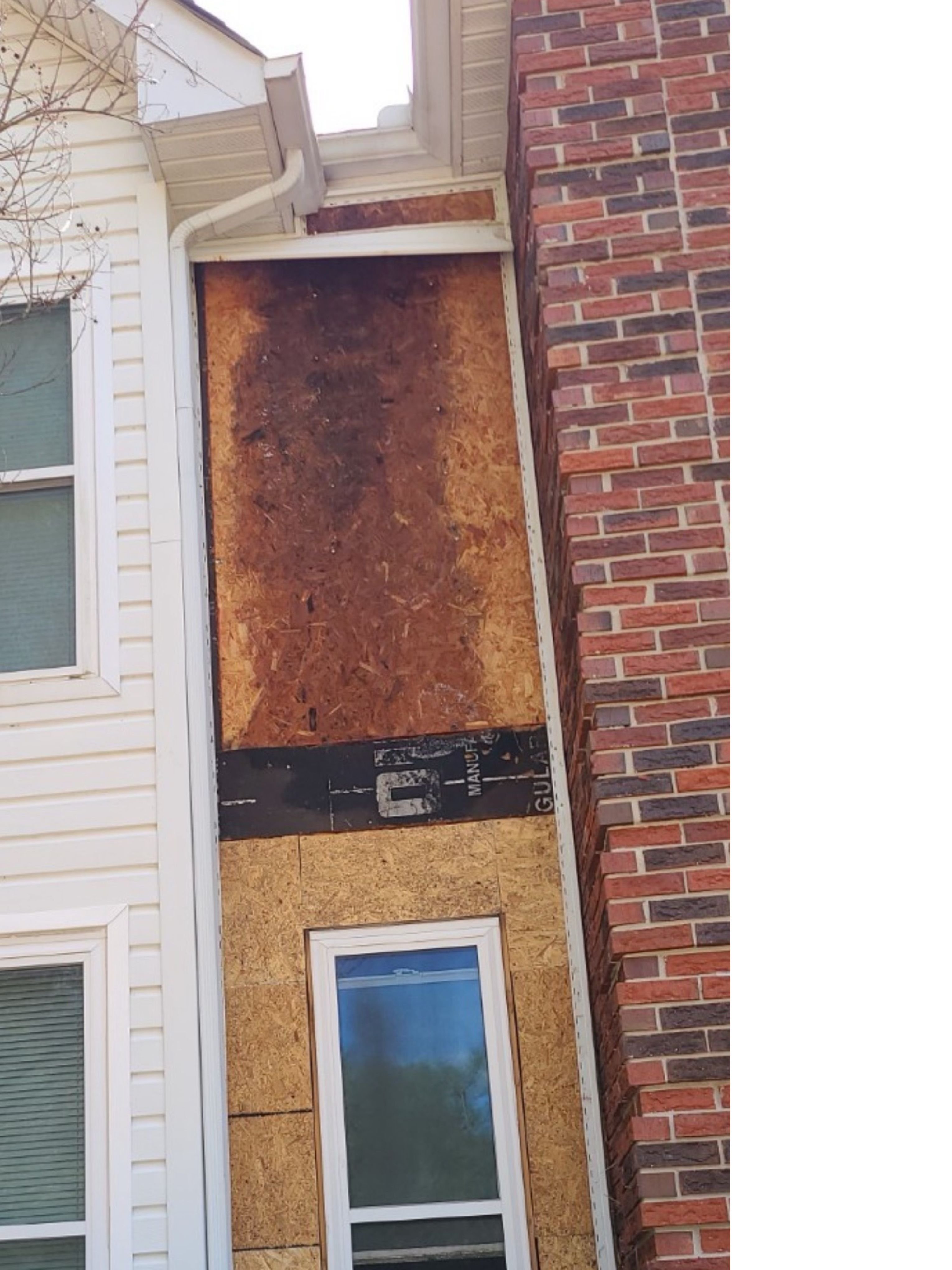 Water damage behind siding